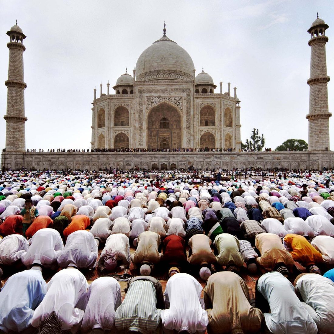 Title of the Work: Eid al-Fitr Namaz  Caption of the Work: Once the holy month of Ramadan is over, the pious get ready to celebrate ‘Eid al-Fitr’, feast of fast-breaking, to thank the Almighty who enabled them to fast & to remember the needy & the indigent. It’s also customary on such an occasion to give gifts to the members of the family, especially children. Once it becomes known that the next day is going to be the Eid, it’s very highly recommended to spend the night preceding the Eid in prayers & adoration.  This picture shows, the Indian Muslims are offering their ‘Eid al-Fitr’ prayer inside the Taj Mahal (since 1983, one of the world Heritage site in UNESCO’s list) at Agra in India.
